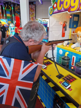 Dad at the shooting range in the Pier at Skegness Lincolnshire Dad at the shooting range in the Pier at Skegness Lincolnshire